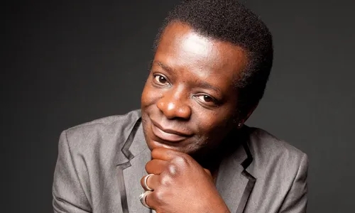 Stephen K Amos
